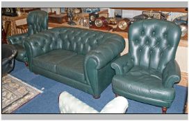 A Traditional Style Green Leather 3 piece lounge suite with a 2 seater club setter, button back with