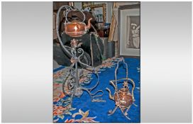 Arts and Crafts Wrought Iron And Copper Floor Standing Spirit Kettle decorated with copper flower