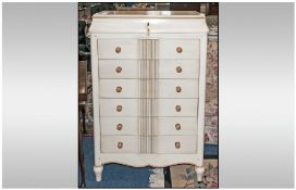 Fine Quality Painted High Body Chest Of Drawers with a seven drawer combination with a shaped top