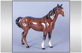 Beswick Horse Figure "Swish Tail Horse" Model number 1182. Brown colour way. Height 8.75 inches.