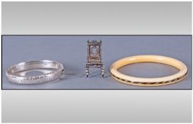 Ivory and Silver Bangles plus a miniature Continental silver chair, the ivory, a solid circular