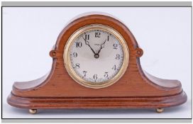 Enfield 1930s Walnut Cased Mantel Clock, Napoleon hat shaped, 8 day movement. Height 6.25 inches,