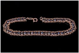 Edwardian 9ct Gold Finely Worked Sapphire Set Mesh Bracelet. Marked 9ct. Length 6.5 inches.