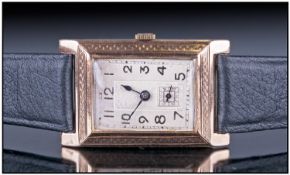 Early 20th Century 9ct Gold Gents Wristwatch, Silvered dial with Arabic numerals and subsidiary
