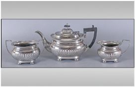 Three Piece Silver Plated Tea Set, tea pot, milk jug and sugar bowl, each with symmetrical