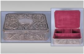 A Good Quality Shaped Silver Plated Hinged Jewellery Box, with embossed floral decoration to cover &