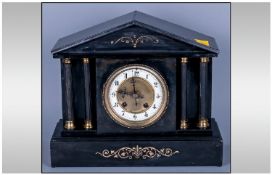 French 19th Century Black Slate Mantel Clock, 8 day striking movement, porcelain chapter ring,