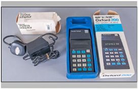 Sinclair Oxford 200 Five Function Calculator. In original box. Together with Sinclair mains adapter.