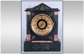 French Late 19th Century Black Slate Mantel Clock, Circa 1880's. Stands 10.75 inches high, width 8.