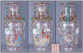 Large Oriental Vase, 26 inches in height. Japanese garden scenes to entire surface. Dog of Foo