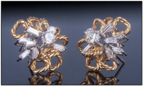 18ct Gold Diamond Earrings, of open floral design, set with a central round modern brilliant cut
