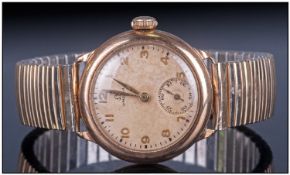 Gents 9ct Gold Omega Wristwatch, champagne dial, Arabic numerals and hands with subsidiary