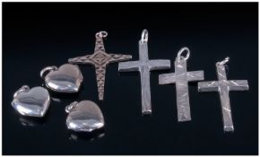 Collection Of Four Silver Cross Pendants,  all fully hallmarked. Together with three heart shaped