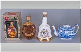 Boxed De Luxe Scotch Whisky, (unopened) 70% proof 26 fl ozs. Together with Bells Commemorative and a