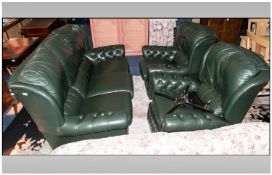 Traditional Green Leather 3 Piece Reclining Suite.  Partly buttoned with exposed wood the arms and