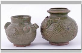 Two Oriental Celadon Glazed Crackle Ware Zoom Phonic Vases. One with incised decoration with Buffalo