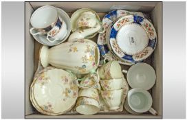 Box Containing Two Part Tea Sets. 1, Crown Chelsea China, blue and floral pattern. 2, Copelands