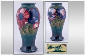 William Moorcroft Signed Baluster Vase, 'Anemone' Design. Signed to underside of vase. Standing 9.