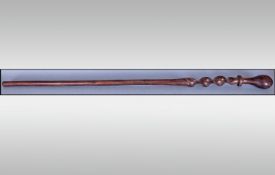 African Tribal Coromandel Walking Stick, ovoid handle above a tapering stick with carved twist
