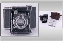 Zeiss Ikonta I High Quality Vintage Roll Film Camera. Features include Zeiss Tessar focusing by