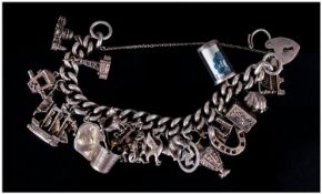 Vintage Silver Charm Bracelet Loaded With 21 Good Quality Charms. All Marked. 138.2 Grams.