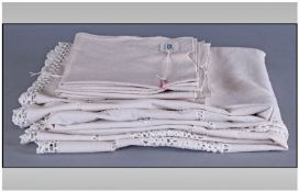 A Linen Tableware Collection Comprising of 8 square napkins (with a scalloped feature to one corner)