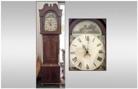 Early 19th Century Mahogany Carved Grandfather Clock with a scroll topped pediment shaped top