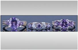 A Small Collection Of Good Quality Silver Set Amethyst Dress Rings. Various designs. 3 in total.