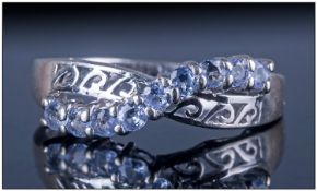 9ct White Gold Dress Ring, set with a row of 9 tanzanite's, fully hallmarked. Ring size N.