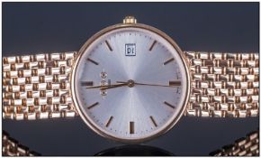 W.H.W 1800 9ct Gold Gents Date Just Wristwatch, with integral 9ct gold mesh bracelet. Fully