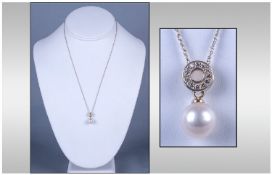 Silver Gilt Earrings And Matching Pendant, set with pearls and CZ stones. Pendant suspended on a