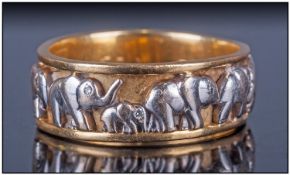 18ct Gold Etruscan Style Two Tone Band Ring, decorated with raised elephant figures in white gold to