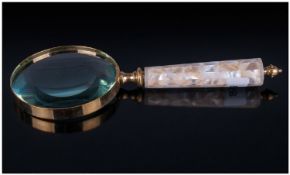 Large Magnifying Glass, brass mounted with mother of pearl effect handle.