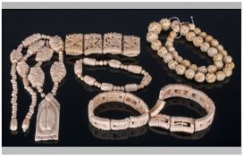 Three Carved Bone Necklaces. Various Lengths. Together with Three Bone Bracelets.