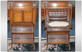 An Edwardian Oak Fall Down Front Bureau, with fitted interior with one shelf below the fall, on