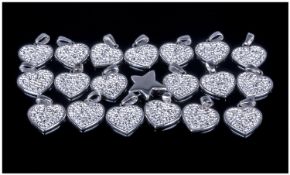 Collection Of 19 CZ Set Heart Shaped Pendants, white metal mounts. Together with plain silver star