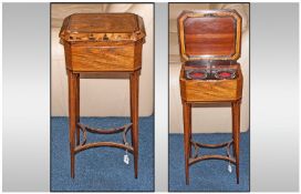 A Fine Regency Tea Poy, 30" In height. Rosewood inlaid with satinwood amboyna. With exotic woods.