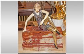 Art Deco Bronze Figure Of A Girl, on a marble base. 9 inches tall, 7.5 inches long.