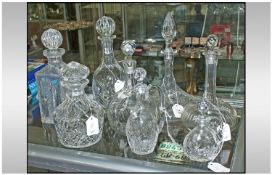 A Collection of 6 Large Cut Glass Decanters, with stoppers. Plus 2 smaller ones suitable for Oil
