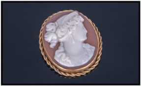 Victorian Pinchbeck Rope Twist Framed Shell Cameo Brooch depicting a classical maiden in profile. 2"