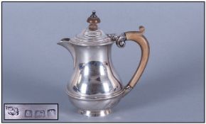 A Silver Water Jug. Hallmark Birmingham 1922. 6 ozs. Height 5.75 inches.