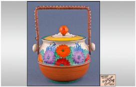 Clarice Cliff Hand Painted Lidded Biscuit Barrel, with basket weave handle, "Gayday" pattern.