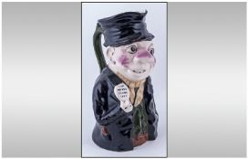 Florid Faced Ruffian Toby Jug Wearing a Badge 'I Am on The Black List', 11.5 inches in height.