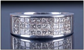 18ct White Gold Diamond Ring, set with three rows of princess cut diamonds. Estimated diamond weight