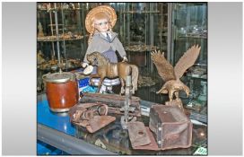 Lot consisting of Biscuit Barrel, Eagle, Doll, Horse and a pair of Binoculars.