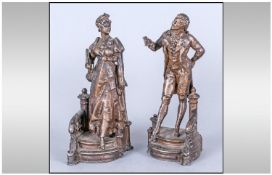 Pair of Romantic Spelter Figures, the couple dressed in Regency attire, each standing on a stair