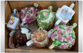 Collection Of 7 Novelty Teapots, various sizes and designs.