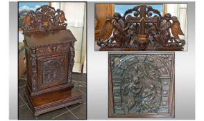 A Seventeenth/Eighteenth Century Pre Dieu in Oak with associated elements. The central door has a