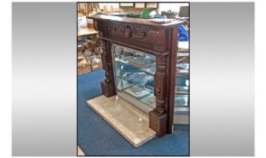 Victorian style Mahogany Carved Fireplace, Carved central panel to the top with side pallisters.