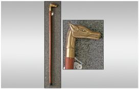 Walking Stick, with screw on top in the form of a horses head, opens to reveal a hidden bottle.